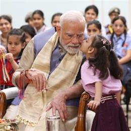 Prime Minister shares glimpses of Raksha Bandhan celebrations at 7, Lok Kalyan Marg